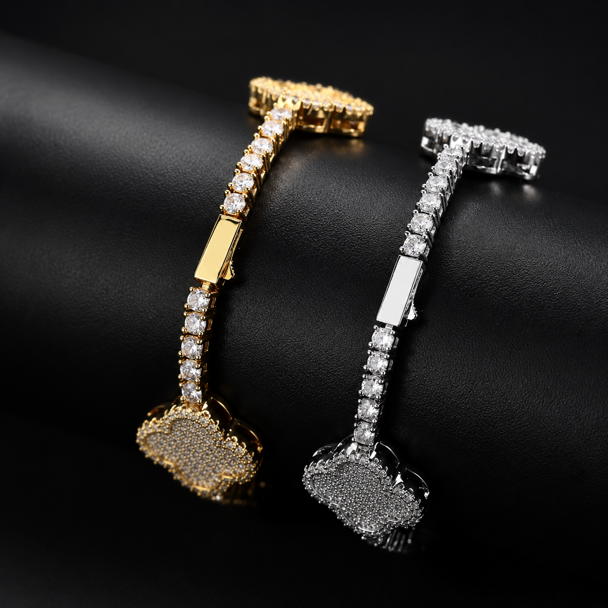 Gold-tone and silver-tone four-leaf clover tennis bracelets shown side by side